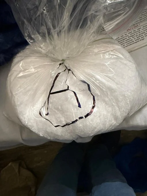 Large clear bag containing suspected seized substance