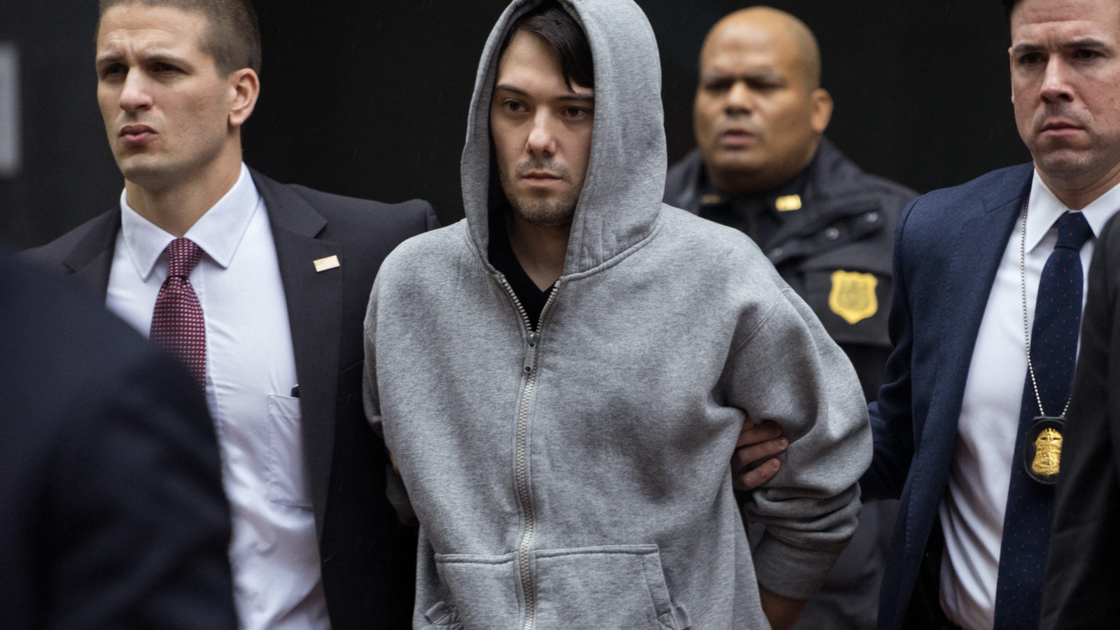Martin Shkreli arrested — escorted by law enforcement