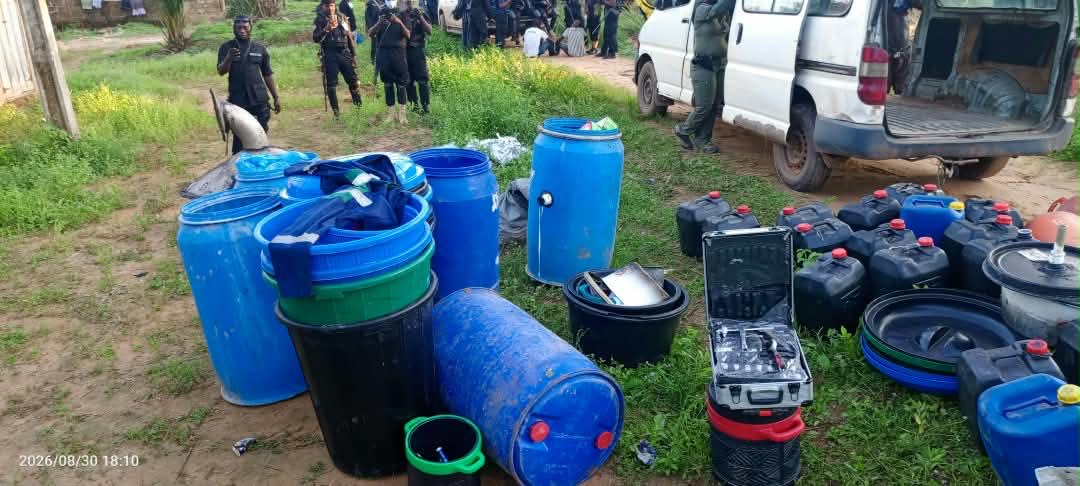 Containers and equipment reportedly recovered from the alleged clandestine laboratory