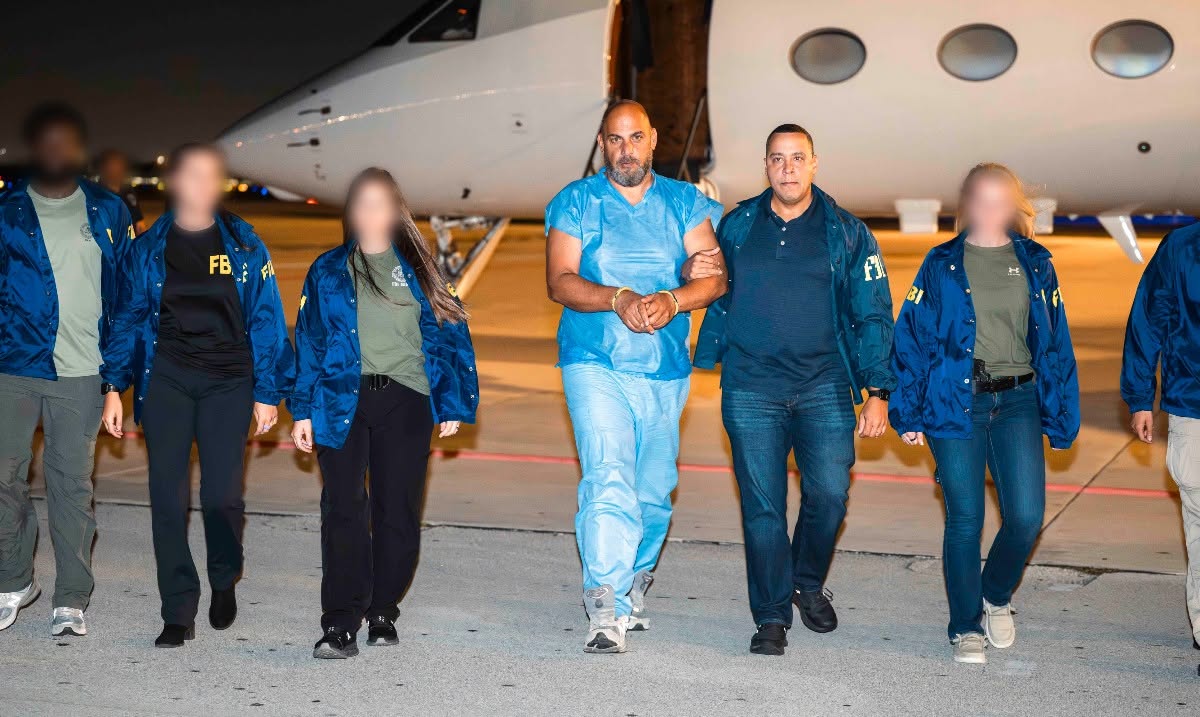 Ibrahim Hilmi escorted by FBI agents