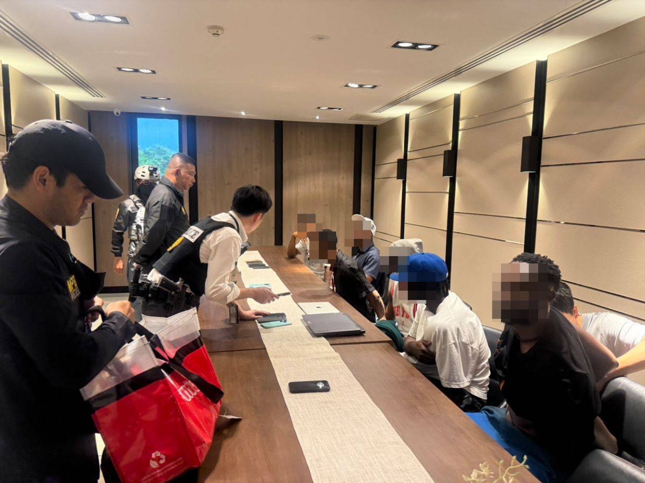 Suspects processed at Nonthaburi condominium following the MPB raid