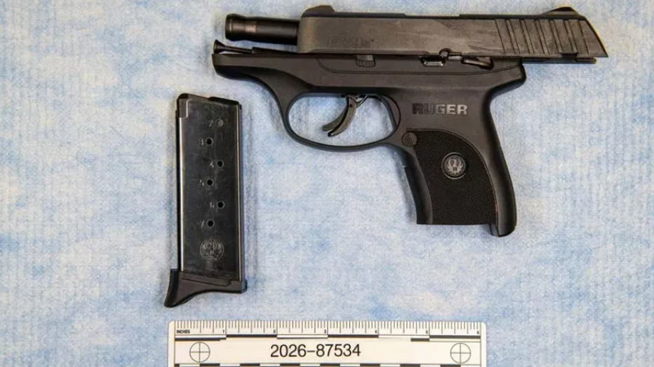 Supplied photograph of a Ruger handgun and magazine on an evidence surface