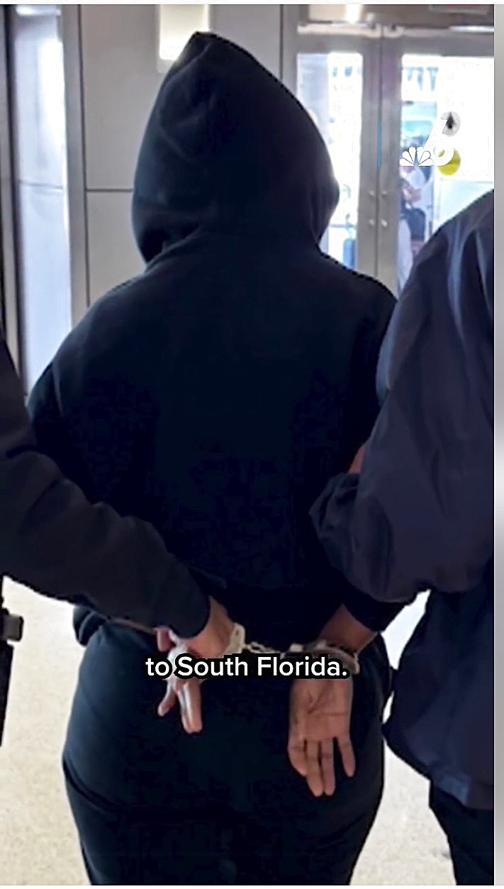 Elaine Escoe — handcuffed returned to South Florida